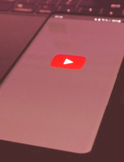 Phone with YouTube logo on the screen